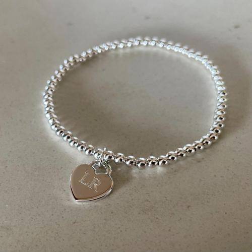 mini-heart-stretch-bracelet-with-initial-LR-engraved-2-1