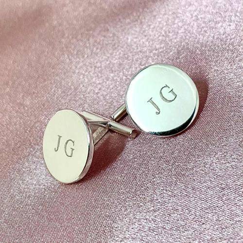 sterling silver round cufflink with T bar back engraved with initials JG